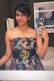 It fits perfectly and the sequin is a really good quality material and doesn't pierce when wearing. Was a very comfortable dress. - Divya C.