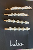 This is a pretty hairpin set. It's delicate and cute. The downside is the way the pearls are attached to the pin which makes them look cheap. - Natalia G.