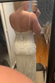 I am wearing this dress for my rehearsal dinner for my wedding in Mexico. The dress was not super long so I don't have it hemmed as long as I wear heels. The slit on the leg comes up to a perfect spot and the material is stretchy but still of great quality. The sequin design is super cute and doesn't rub too much on the arms, all around a great dress. Can't wait to wear it on my day! - Bailey C.