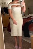 I cannot wait to wear this to my tea party bridal shower. It's simple enough to add a lot of accessories but still super trendy. It also gives me an hourglass shape which is a plus. I love it! The inside of the dress also has a sticky lining to help keep the dress up. My chest is on the smaller side so that's a huge plus! - Brittany S.