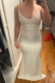 I ordered this dress to wear at a white party on the beach the day after my wedding. The dress is great quality, not see-through at all, it was a little tighter on my abdomen than I would like for photos so I am ordering it in the next size up (I am always in between sizes with Lulus). The material is very stretchy and comfortable but also looks very elegant. Can't wait to wear it! The dress is very long on me and would likely need to be hemmed unless you are wearing very tall heels or are on the taller side. - Bailey C.