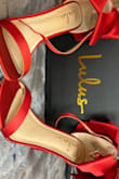 I am in love with these shoes! Fits perfect! The material is silky and looks very expensive! I bought these for my Christmas wedding and they are absolutely perfect!! The bow on the back just makes it!! - Alexis Y.