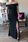 I ordered this dress as a potential bridesmaid dress and ended up returning it because another bridesmaid had ordered one with a similar neckline. I liked the dress and fit, though! I was between a medium and a large and went with a large based on the other reviews. I was happy I did, because the fit was flattering but not too tight. - Phoebe P.