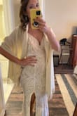 I wore this as my second dress/dancing dress for my wedding in southern Spain in October 2021 and it fit absolutely great on me. It was very comfortable for dancing. I also wore it for a dinner party back in the States with friends and family that could not make it to Spain and I was happy I could use it twice. I have big hips compared to my upper body so I thought it would accentuate it more and look awful but it actually fits very nicely around my hips. I had ordered 4 dresses from Lulus to try and this one was the winner. The pictures in my review are from the second time I wore the dress for our post-wedding dinner party, it pairs nicely with a cashmere shawl for colder weather. - Ana B.