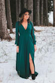 I absolutely love the color & style of this dress! If you are smaller busted like me, keep that in mind as it is WAY too big from the shoulders to the bust for me. I pinned for professional pictures about 3" up on each side at the shoulders or my bra/chest would've been out. Excellent quality material also! Very long but to be expected with this style dress. I plan to have altered in the two areas mentioned to wear more comfortably in the future. - Kellie O.