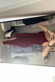 This dress fits like a glove. Very flattering and still appropriate. The tie in the front is nice because it hides the belly. Wearing this to a wedding at the end of the month. - Paige G.
