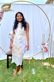 Wore this dress to the end of my engagement party and for my surprise bridal shower. So perfect! I didn't even know I could rock such a slender dress but the dress made me look amazing! The perfect dress for a bride! - Aarthy K.