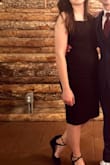 I wore this to a friend's wedding and it was snug without being too tight (I'm generally a small/4 on top, medium/6 or 8 on bottom). It's thick and stretchy and really comfortable. It looked great and I loved the exposed zipper in the back. The slit on the side came up a little scandalously high on me when I sat down so it had to be adjusted a bit, but that's no biggie. - Katie S.