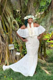 I looked for the perfect wedding dress for probably 6 months. I was getting married in Hawaii and I wanted something easy-breezy without all the fuss, but still beautiful. This dress was out of stock a few months before my wedding. I was lucky enough to see just one dress become available on the website one day and I ordered it. It fits like a glove. **cue tears of joy** No alterations either. There is lining on the inside but it's super comfortable and isn't annoying. The bust area isn't too small either. The elastic around the top didn't cut in or dig at all. I am a curvy lady, and most of the time dresses fit my hips but are too big in the bust, or fit perfectly in the bust but are too tight on my hips. I ended up wearing Spanx under the dress just because but true story, it would have been just fine without it. It lays very nice and I wore my dress all day long with no issues! I would not have believed you if you told me my wedding dress would be a little over $100. Unbelievable! - Tiffany P.
