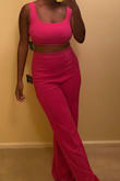 In most clothes I wear a large but I almost always size up for Lulus so I initially bought this in an XL and red.. surprisingly it was too big and the pants were extremely long (which rarely happens). I decided to buy the L in hot pink and it fits like a glove. The pants are still a little long but I haven't tried them with heels yet. Regardless I cant wait for the weather to warm up so I can wear this outfit. - Dominique D.