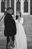 What an amazing find and it made for the perfect wedding dress! We had a very casual, outdoor wedding and this dress was a true match. I would definitely recommend to size down, I am normally a Large 10/12 and I sized down to a Medium. It fit great and didn't need any alterations. I would highly recommend this dress! - Haley L.