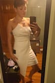 The quality of the fabric was really nice right out of the package. Zipping it up was a little tough at the waistband part, but I think that's just because it's new. Once on and up, the dress fit perfectly! Very happy with it! - Shea R.