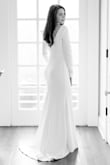 I purchased this dress last minute for our anniversary photos. The one I ordered from a different company didn't work out and I was panicked. The shipping was super quick and as soon as I tried on the dress, I was so happy. It fits like a dream and the quality is fantastic! It's a little big in the chest area for me, but I have a very small chest and it still looked beautiful. Would 100% recommend. - Carrie L.
