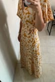 I'm in love with this dress, it fits perfectly. I'm short so I have to wear it with heels but it's just perfect. - Majo S.