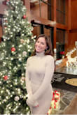 This is a high quality sweater dress made with thick material. It hugs you in all the right places and keeps you warm. It is really well-made. I love this dress! - Ann M.