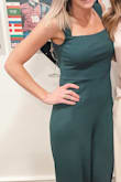 Looked great and I felt great in it! Got lots of compliments at a party. I did have the bottom hemmed, and had the sides taken in a bit. I think XS would've been too small though so the alterations were totally worth it! - Kody N.