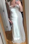 I ordered this just as a "test dress"; with lockdowns in effect, and with limited stores in my city to begin with that sell bridal gowns, I wanted to get an initial feel for what style of dress I'd prefer. I do not wear dresses, so I figured I'd be in for a lengthy hunt for a style that suited my taste. And with such great prices, I figured I would order a few and send back what I didn't like. I ordered this as my first style option, and I think the hunt is (already) over! I read suggestions on adding a sparkly belt to jazz it up, and I plan on doing just that! I input my measurements and a size large was suggested. I'm pictured without shapewear on, but plan on purchasing that as well, to smooth out the lumps and bumps :) This is a beautiful dress, made of heavier high-quality material that I would've never imagined came with a dress for under $150! (I'm from another country and had to pay duties once it crossed borders) but it was still insanely cheaper than I had planned on for a wedding dress! - Kathryn K.
