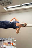 I went up a size and could have fit a small but decided on medium due to lack of stretch. Runs long. - Estella C.
