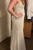 I am curvy but the small size fits all my curves just right. The beading is gorgeous. Excited to wear this for my wedding this summer. : ) - Erin S.