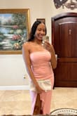 It's a little more pink in person, but still a beautiful dress. Wish it stayed up a little better at the top as well, but it was doable. Everyone thought I looked great! Good quality. - Mackenzie N.