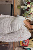 This is a very beautiful, classy dress. I love the quality and fabric it is made out of.
The dress fit well, except in the shoulders and bust area. It has a deep v front which didn't give much coverage to my chest. The shoulders slipped off and were loose as well. I took the dress to a seamstress and had the v front taken in some and a piece of fabric added to the inside. It fit much better after that. A bride with a smaller bust like the model shown, wouldn't need to alter the chest. I received many compliments at my wedding on how beautiful this dress was. It is very well made and so affordable!! I highly recommend Lulus. - Sandy H.
