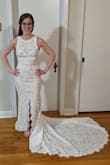 I chose this dress as my wedding dress. It is very flattering on me and fits perfectly around my hips. I just had to get the top part altered a bit, but otherwise is a great fit. - Angela B.