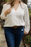 This shirt is so gorgeous! It's hard for me to find tops that fit my chest and wide shoulders without making me look bulky and top-heavy. But this one is so feminine and pretty and flattering! I would buy in every color if there were more colors! - Kelly D.