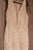The dress is absolutely stunning. The pictures do not do it any justice. The quality is amazing. Would recommend anyone debating on buying it to buy it now!!! - Seerah C.