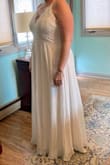 Bought this dress for my upcoming backyard wedding. Love the feel and look. Very comfortable and great material. Need to have it shortened a little but that's it. Can't wait for my big day!!!! - Mindie R.