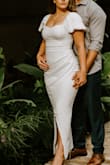 I sized down when I originally bought it to size XS, but it fits perfectly throughout all seasons of my body. It has some stretch so even if I weigh a little more, it still looks great and hugs my curves in the most flattering way. I wore this to my bridal shower and got so many compliments. - Emily G.