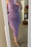 Great pick! The dress fit true to size (though I still needed my Spanx for the mid area). Really comfy, has good material, and looks great with heels. Perfect for bridal or baby showers. - Colleen L.