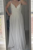 Let me start off by saying that I love this dress so much, that even with my issue with it, it's still my dress for my small wedding! It's the perfect dress! My issue with it is that it's see through. You can see the cups on the top and the bottom is see through to the point that you can see the pockets and also any colored underwear. I talked to Lulus about it and they sent me a replacement dress thinking it was just a defective dress, but they were both see through. Lulus did right by me and I'm a happy customer. I am going to get it hemmed, the straps taken up and the bottom lined. For $100 you can't beat the gorgeousness! I'm also adding a small sparkly belt that I also got from lulus! - Amber A.
