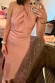 I decided not to keep the dress due to the color not standing out with my skin tone. Overall the dress can be stunning with the right heels and some alterations. If you are on the shorter side it will fit right by your ankles. Chest area also continued to expose a gap in the center, but if you sew it together it will work perfectly. I'm also usually a small but went with the xs. - Diana E.