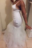 The dress looked exactly how it looked on the model. The quality is good. I would recommend it. - Gabrielle T.