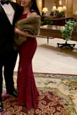 Wore this to a black-tie wedding. Very comfortable. I ordered in a M and S but kept the S as the M as too loose around the top (although fit better around my hips/thighs). The slit was high which wouldn't be a problem but because the S was tight around my hips/thighs it would open more than I wanted when I would sit and once or twice I was concerned it was going to tear. I ended up using safety pins to close the slit by about one inch and that was perfect. Overall really happy with this dress! - Caroline S.