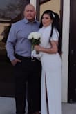 This dress was perfect for my small intimate wedding. I felt so beautiful and hugged my body perfectly.  I got so many compliments on how beautiful and elegant I looked. I did had a throw fur over my chest area only because we were in a church setting. - Christina M.