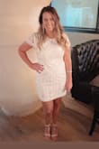 I wore this for my birthday and the fit was great. It was a bit short on me once I sat down, but overall I loved it. I normally wear a large but sized up to an xl bc of the other reviews and I was glad I did. It wasn't stretchy but it had a nice shape to it. - Sarah H.