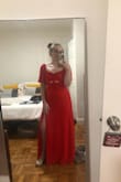 I wore this to a beach wedding and it made me feel absolutely amazing. The slit isn't too high, the peekaboo in the stomach area is just the right size, and the sleeves hid the tops of my arms (which I am very self-conscious about). Honestly, standing on the beach with the wind blowing the skirt around me gave me major main character energy! I didn't have to hem it despite how short I am (I wore heels). One thing I will say is that the material isn't super forgiving in the midsection, so I wore shapewear underneath, but if you have a flatter tummy (or aren't self-conscious about it like me), that wouldn't matter. I can't wait to wear this again! - Emily S.