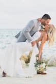 This dress was absolutely perfect for my wedding day! The quality feels way higher than the price! My friends were shocked when I told them the price! The dress is a little long for 5'5 height so I did have to alter the length which was easy and not expensive! I also added the belt that I found on Amazon for only $12! - Jaclyn L.
