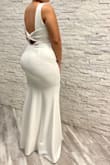 This dress is perfect, exactly what I was looking for, elegant, classy and simple. It fits true to size, the fabric is great and not see through. I wore it for my wedding in Las Vegas. - Ruth S.