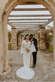 Loved the dress for our elopement but would have like a flower feel. Definitely size up if you don't want it to feel tight - Jenifer C.