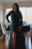 I absolutely love this dress! I am not that tall and I thought I would need to have it hemmed, but it was perfect. I wore it casually with a jean jacket and boots and have dressed it up and wore it to a wedding. It is so sexy and comfortable. The fit is great. It hugs the body nicely and the slit in the front is so sassy. - Tania C.