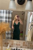 This dress looks and feels amazing! The material is super stretchy and comfortable. I can't wait to wear it for a Mardi Gras ball! - Crystal C.