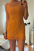 The color didn't look good on me and the dress was way too short!  But cute overall if you have the right skin tone and aren't so tall. - Jena S.