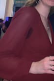 This dress was baggy for a size small. I'm 32B and 140 pounds and it made my chest look very flat because I didn't fill out the chest part. I usually don't have any issues with sweating, but I sweat the tiniest amount early on in the night and the sweat stained the mesh part of the dress. Walking around with pit stains all night at an office party was embarrassing! Now I have this expensive dress that I will never wear again; disappointing. - Heather L.