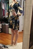Great dress and a great fit! For a true wrap dress it stays in place and doesn't loosen as you wear it. It is however a little low cut and if you are smaller chested like myself it may gap on you. But overall I really like the dress and would purchase it again. - Samantha B.