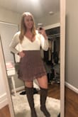 At first I almost returned the skirt because I ordered the top it came with and didn't like how the outfit was together. When I wore it with a long sleeved body suit that was form fitting the skirt looked much better. It was cute and dainty. The material isn't exactly what I thought it would be but I got so many compliments on my outfit! - Janelle S.