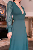 The dress was gorgeous for my friend's winter wedding! I got so many compliments on the color and the open back. The fit was perfect aside from being a tad long, but even that was perfect for heels!
The back tie started to tear at the seam of the dress but I think I might've tied it a little too tight for the amount of dancing I was doing, definitely fixable. - Phoebe M.