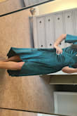 Wore this for several holidays, the wrap is very secure and the material is thick and flattering. It's a little long in the back but with heels, it worked for me - Meaghan P.