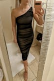 I absolutely love this dress and my husband does too! I bought this dress and a couple of others for a date night and this one definitely won. The reviews said it was very flattering and stretchy, and it absolutely is! I could gain a little weight or eat a big dinner and be totally fine. I bought a medium. If I wanted it tighter, I could size down to a small but I'm squishy in the middle and don't like super tight clothes. It's perfect. - Erin S.